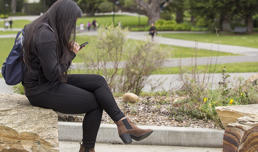 Student using smartphone